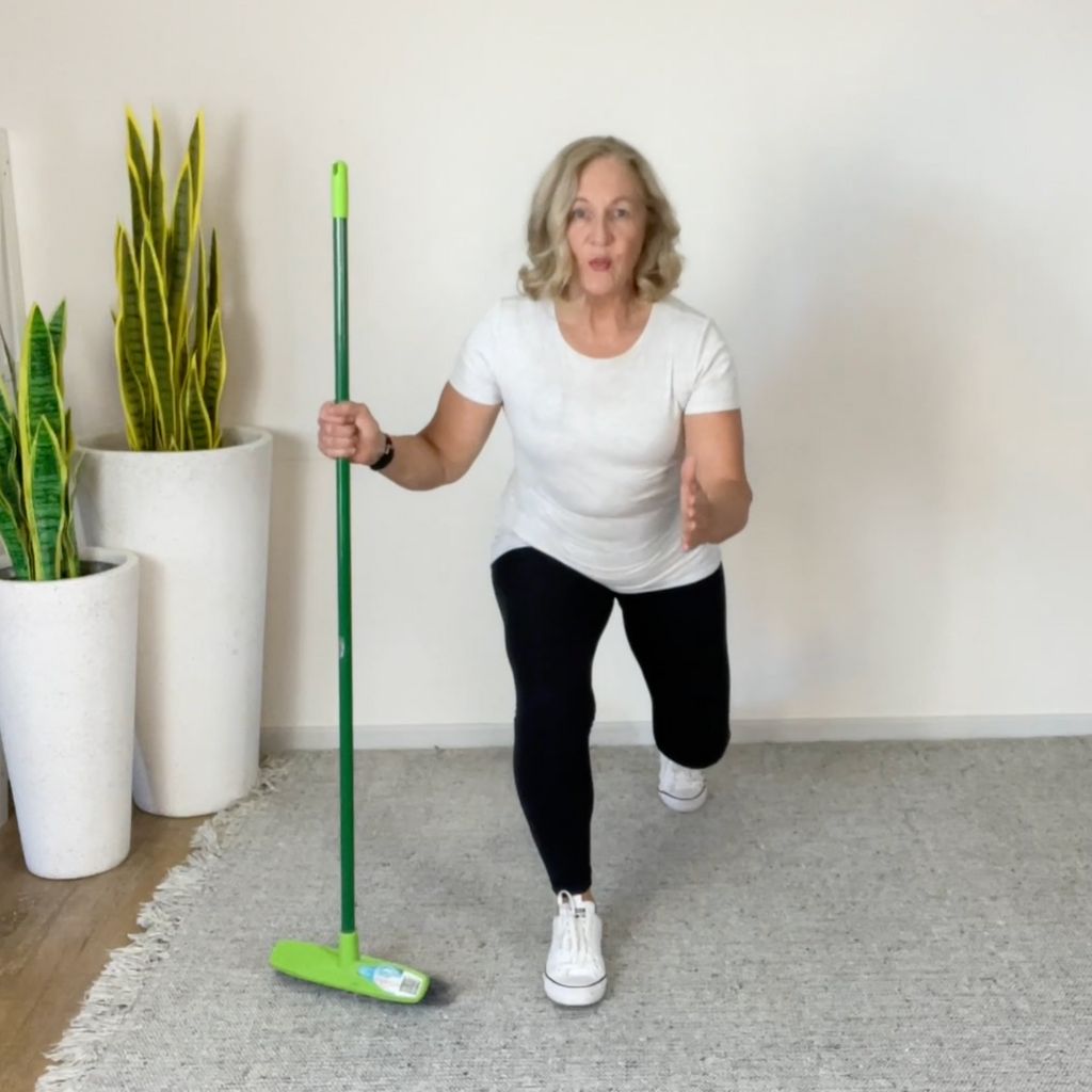 Broom assisted lunges