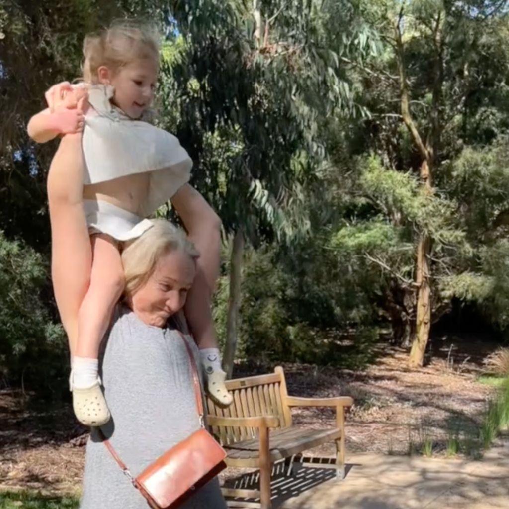 overhead lift toddler onto shoulders