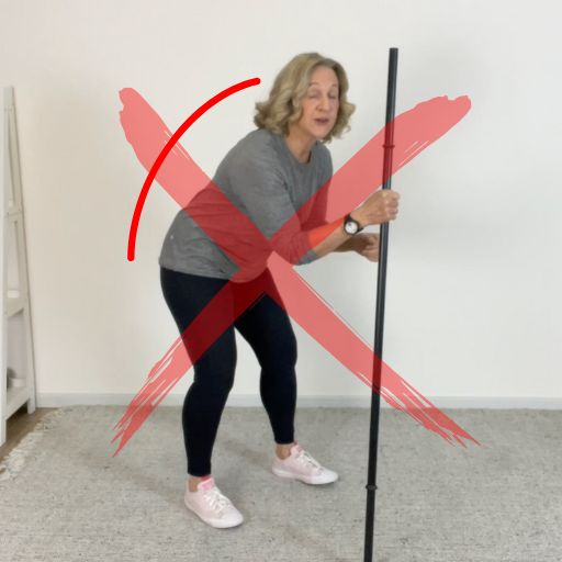 broom assisted squat 2