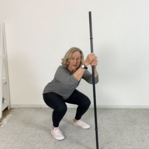 broom assisted squat 4